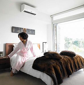 Woman in Comfortable Bed